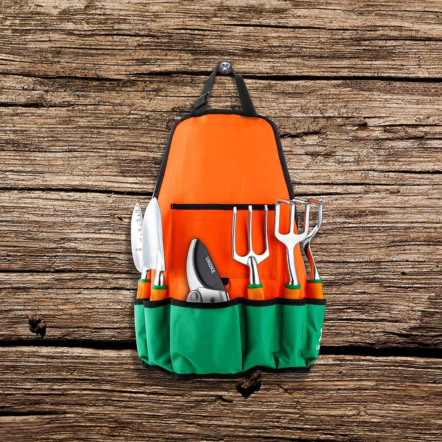 gardening tools in storage apron